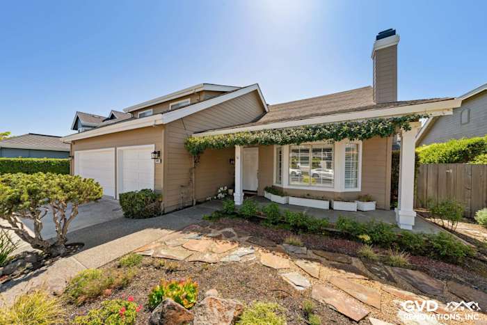 New home exterior featuring Khaki Brown James Hardie siding and Arctic White trim in Foster City