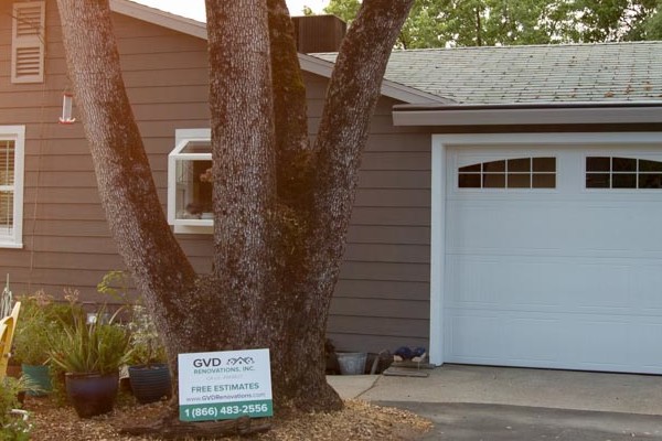 Elegant home exterior in Auburn featuring Aged Pewter HardiePlank siding and Arctic White trim