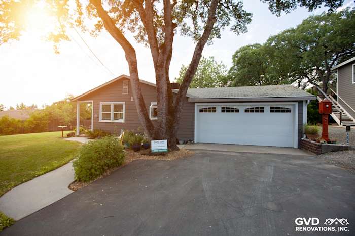 Elegant home exterior in Auburn featuring Aged Pewter HardiePlank siding and Arctic White trim