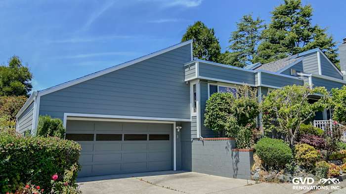 Gray Slate James Hardie lap siding with Arctic White trim on a Millbrae, CA home exterior