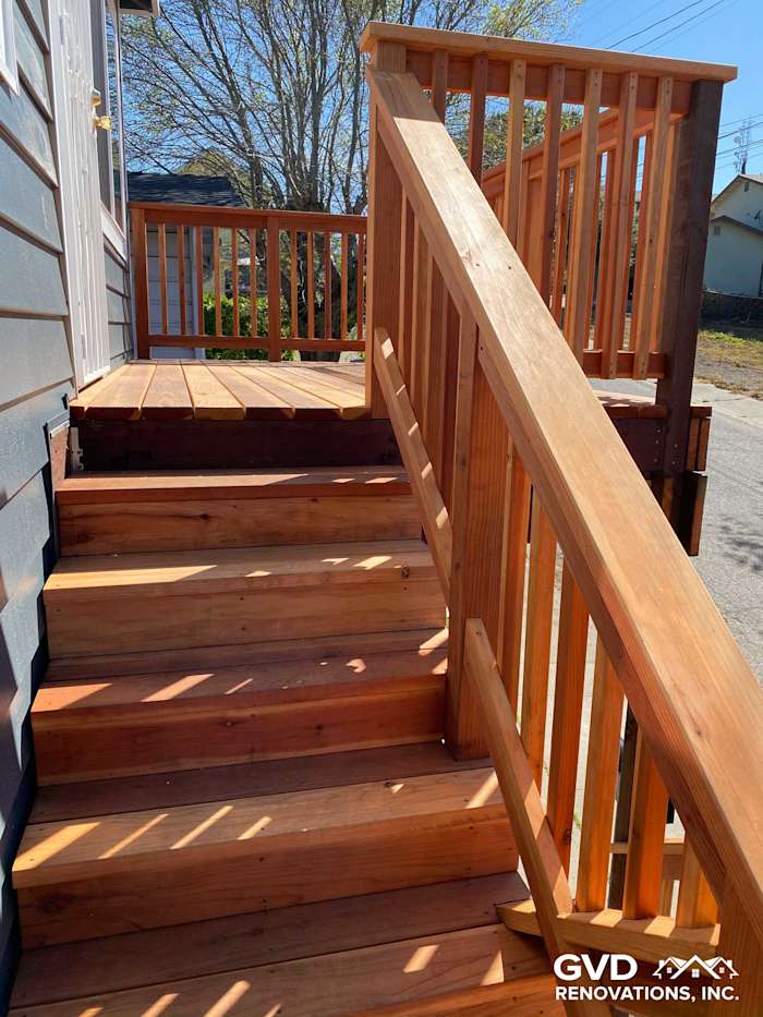 New wooden deck and steps with railings, showcasing a fresh exterior update in Rio Vista, CA