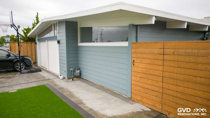 Newly installed Boothbay Blue James Hardie siding with Arctic White trim on a San Mateo home exterior