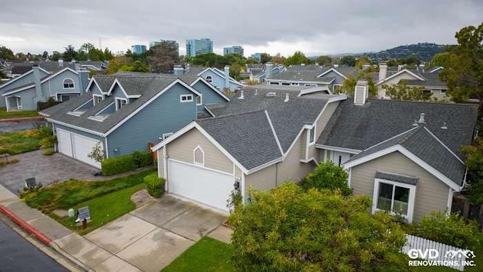 Foster City home exterior showcasing James Hardie siding in Monterey Taupe and new Milgard windows