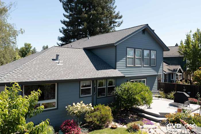 Home exterior featuring new Boothbay Blue James Hardie siding and Milgard windows in Rohnert Park, CA