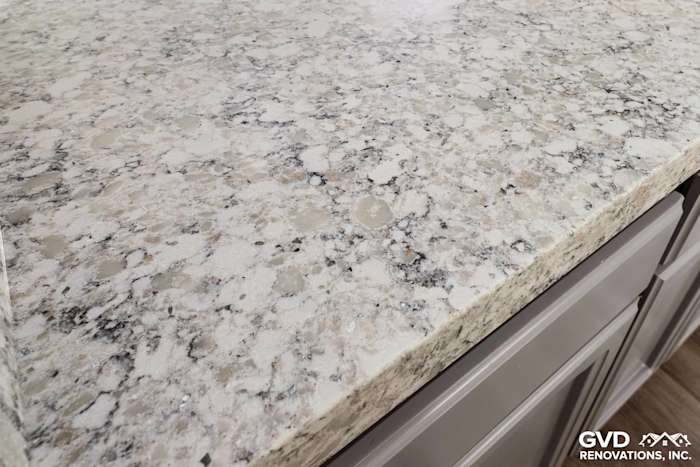 Close-up of a light-colored granite countertop with speckles, in a remodeled kitchen in Carmichael, CA