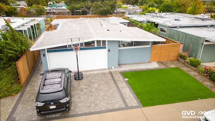 San Mateo home featuring James Hardie Boothbay Blue siding and Arctic White trim, landscaped driveway and lawn