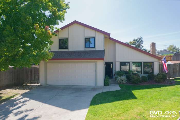 Updated home exterior in Orangevale featuring T1-11 siding and Anlin windows with a contemporary design