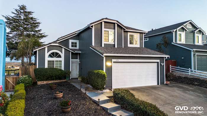 Modern home exterior featuring James Hardie Evening Blue siding and Arctic White trim in Vallejo, CA