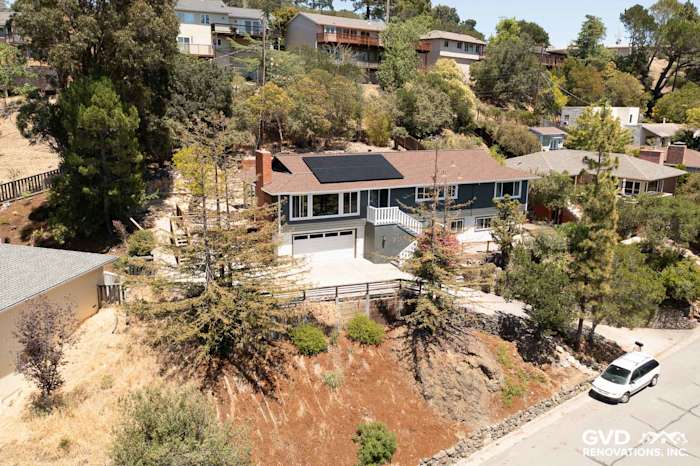 Modern home exterior featuring James Hardie Iron Gray siding and Arctic White trim in San Rafael