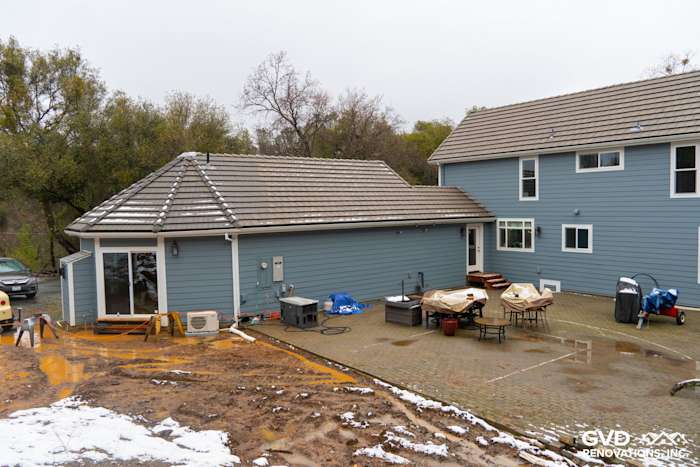 Sutter Creek home featuring newly installed Boothbay Blue James Hardie siding and Milgard windows, showcasing modern curb