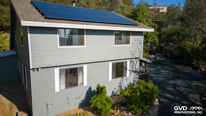 Gray Slate HardiePlank siding with Arctic White trim on a transformed Colfax, CA home exterior