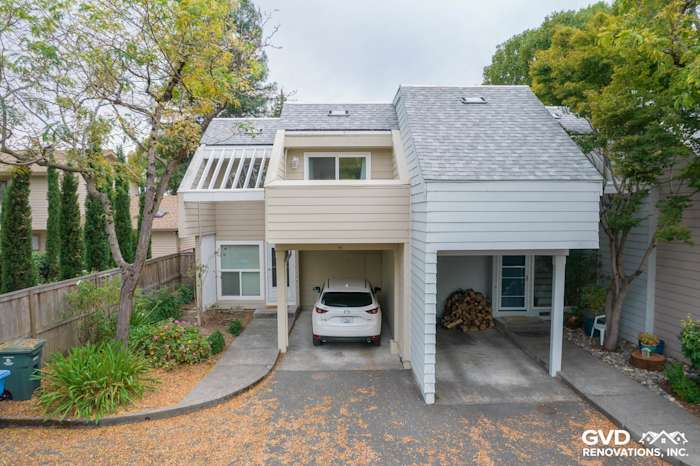 Updated quadplex exterior featuring James Hardie siding, modern roofing, and an inviting carport in Santa Rosa