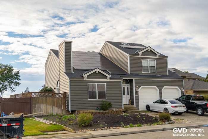 Modern home exterior featuring Prodigy Siding in dark gray with solar panels in Stockton, CA
