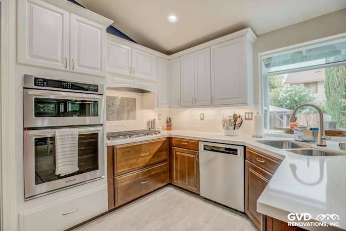 Modern Elk Grove kitchen remodel featuring quartz countertops, white cabinetry, and stainless steel appliances