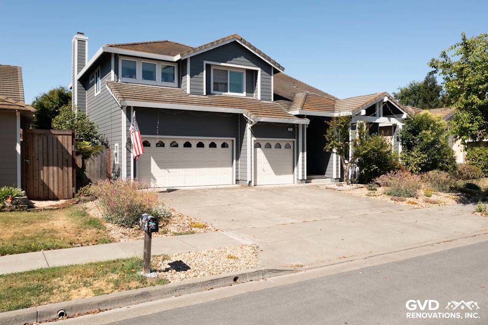 Home exterior renovation in Petaluma featuring Night Grey James Hardie siding and Arctic White trim