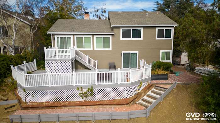 Benicia home exterior featuring Timber Bark James Hardie siding and Arctic White trim with a spacious deck