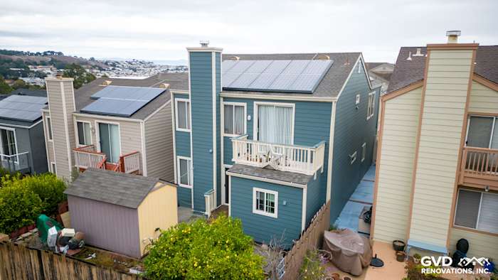 Daly City home with Evening Blue James Hardie fiber cement lap siding and solar panels on roof