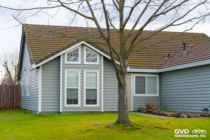 Home exterior featuring Prodigy Solid Core Insulated Siding, painted eaves, and a sloped roof in Sacramento