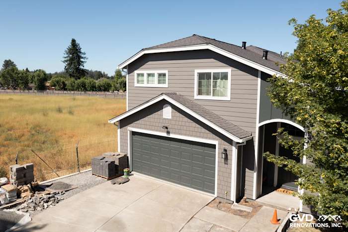 Renovated exterior featuring James Hardie Aged Pewter siding and Arctic White trim in Rohnert Park