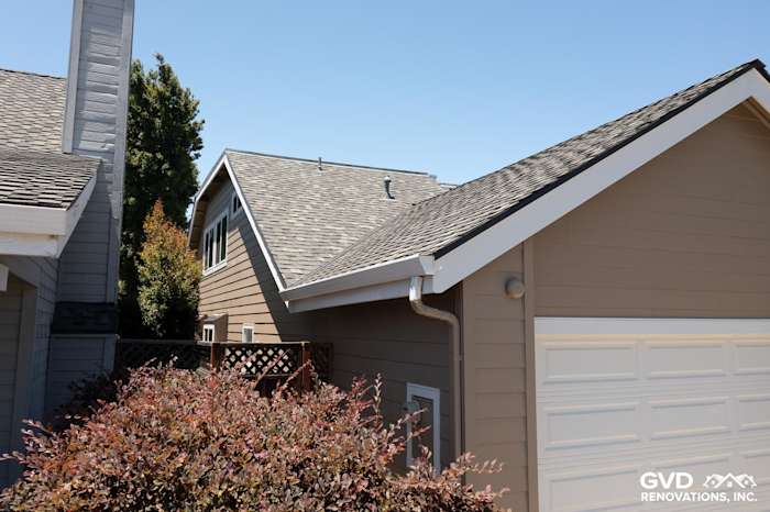 James Hardie Artisan Lap Siding in Khaki Brown with Arctic White trim on a residential home in Foster City