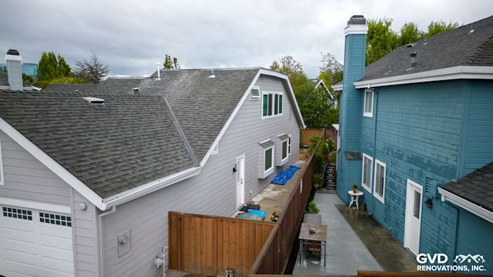 New Pearl Gray James Hardie siding and Milgard windows on a residential home in Foster City, CA