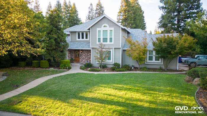Fair Oaks home exterior featuring James Hardie Monterey Taupe siding and Arctic White trim, landscaped yard