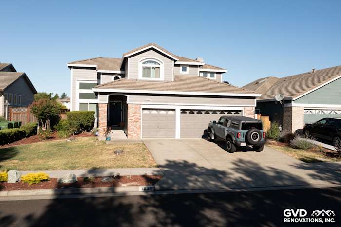 Modern two-story home exterior in Petaluma with James Hardie Aged Pewter siding and Alside Mezzo windows