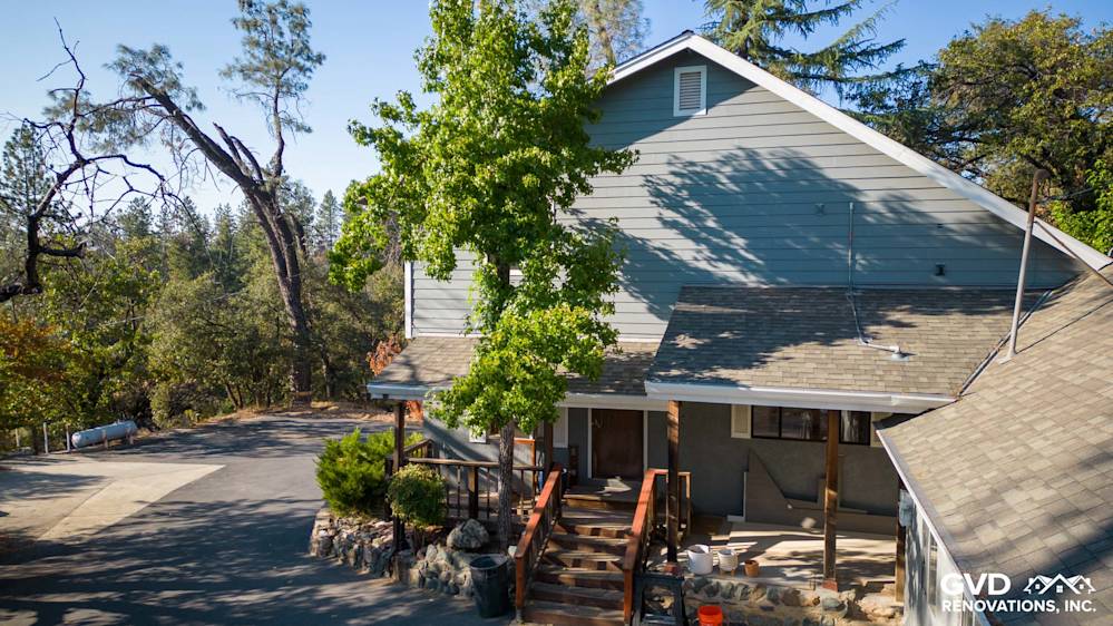 Gray Slate James Hardie Lap Siding with Arctic White trim on a renovated Colfax home exterior