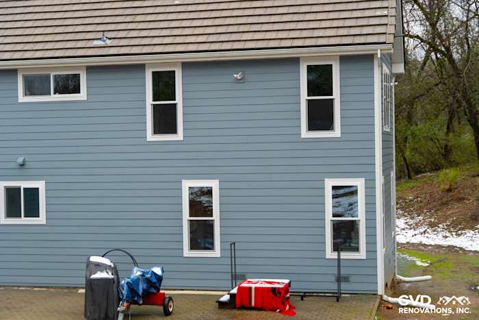Boothbay Blue James Hardie siding with new Milgard windows on home exterior in Sutter Creek, CA