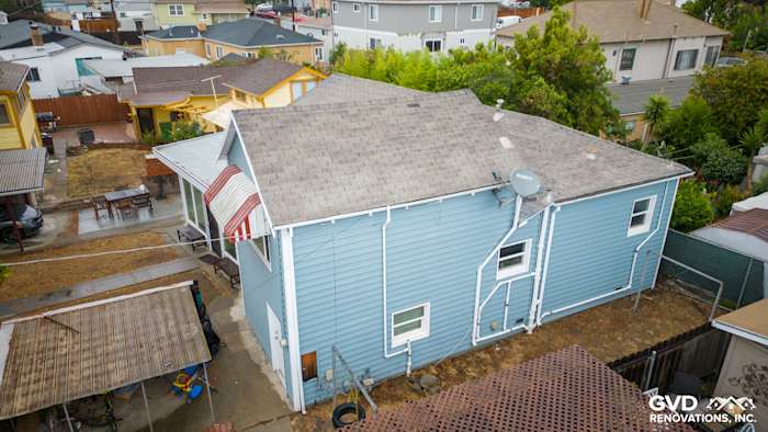 New Alside Prodigy vinyl siding in light blue installed on a residential home exterior in Oakland, CA