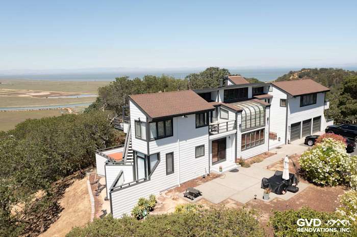 Modern home exterior showcasing Arctic White James Hardie Lap Siding and unique architectural details in San Rafael