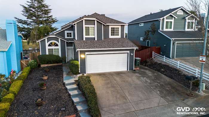 Modern home exterior featuring James Hardie Evening Blue Siding and Arctic White Trim in Vallejo, CA