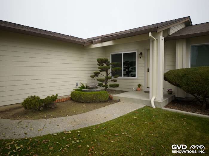 Suisun City home exterior featuring James Hardie Navajo Beige Lap Siding and landscaped entryway