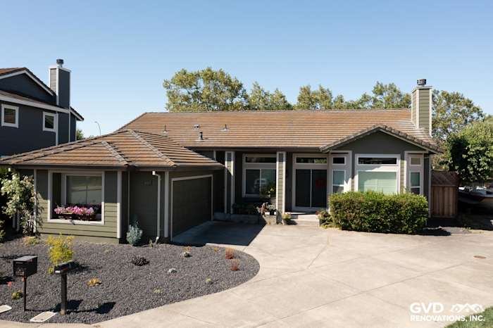 Petaluma home featuring Mountain Sage James Hardie siding and Cobble Stone trim, modern facade and landscaped yard