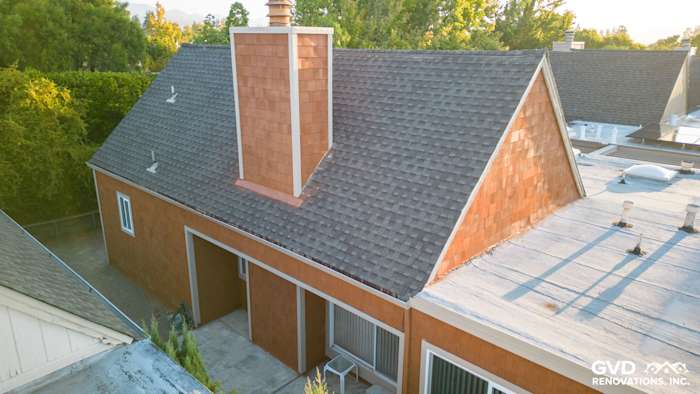 Cedar panel siding in warm tones on a home exterior with a chimney in Sonoma, CA