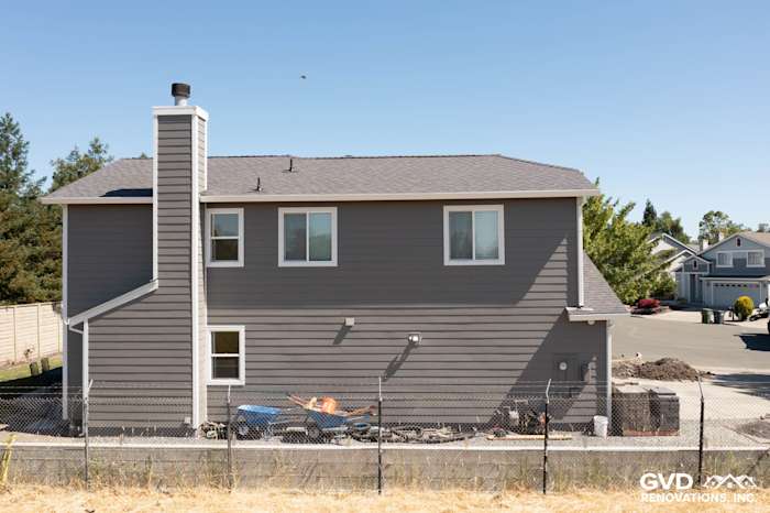 Charming Rohnert Park home featuring James Hardie Aged Pewter siding and Arctic White trim, showcasing a cozy exterior