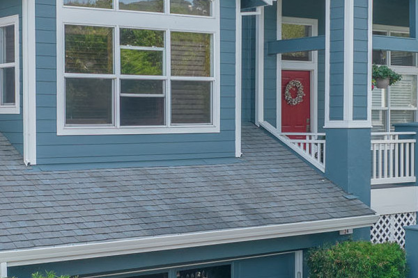 Modern home exterior featuring James Hardie Evening Blue siding and Arctic White trim in Corte Madera, CA