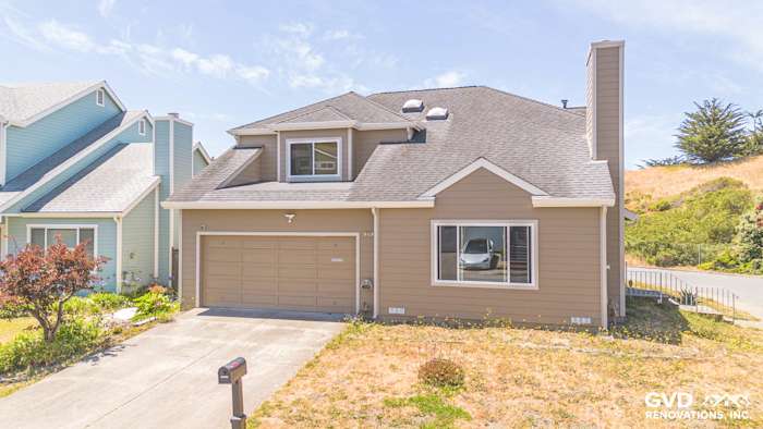 Pacifica home exterior with Khaki Brown James Hardie Lap Siding and Anlin Windows, featuring Cobble Stone trim