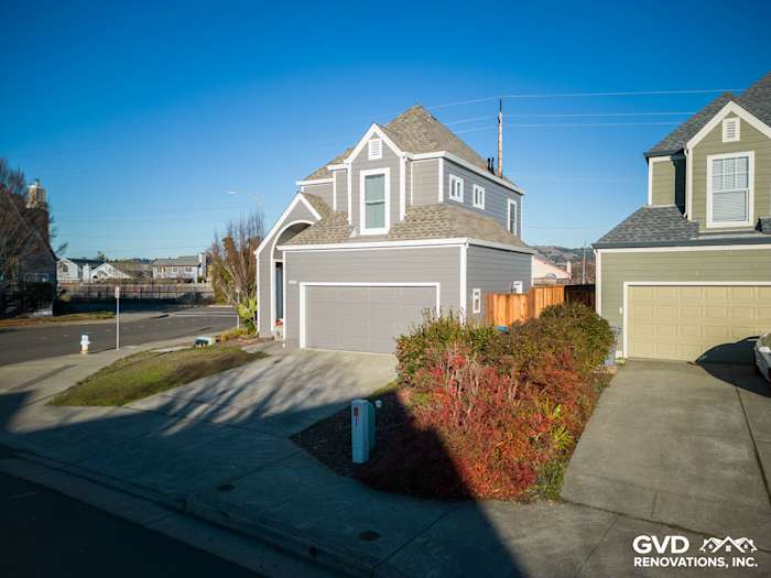 Modern home exterior with Aged Pewter James Hardie siding and manicured landscaping in Santa Rosa, CA