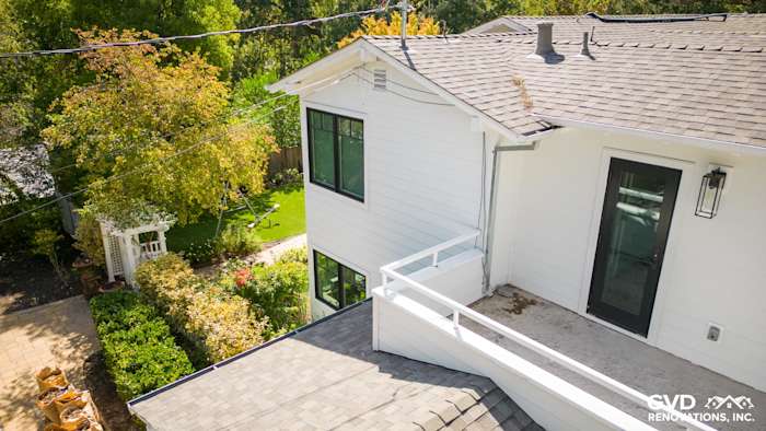 New Arctic White James Hardie siding on home exterior with modern black windows in Orinda, CA