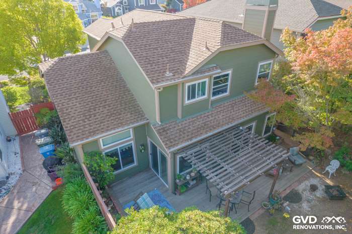 Two-story home with Mountain Sage James Hardie siding and wooden pergola in Vallejo, CA