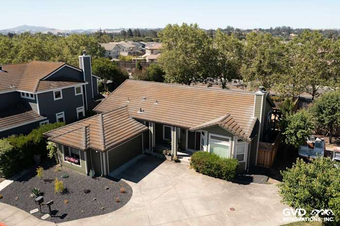 Petaluma home featuring Mountain Sage James Hardie siding and Cobble Stone trim with landscaped yard