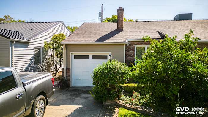 Home exterior in Sacramento featuring fresh Khaki Brown James Hardie siding and landscaped yard