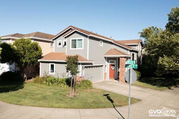 Home exterior featuring James Hardie siding in Gray Slate with Arctic White trim and new Milgard vinyl windows in Petaluma