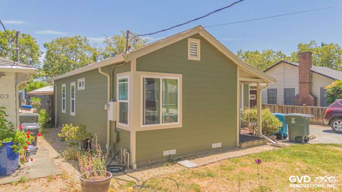 Home exterior featuring Mountain Sage James Hardie Lap Siding and Anlin Catalina Windows in Redwood City, CA