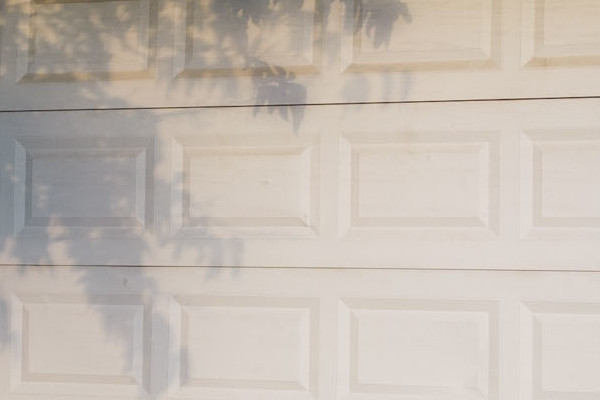 Cobble Stone James Hardie lap siding on home exterior with white garage door in Orangevale, CA
