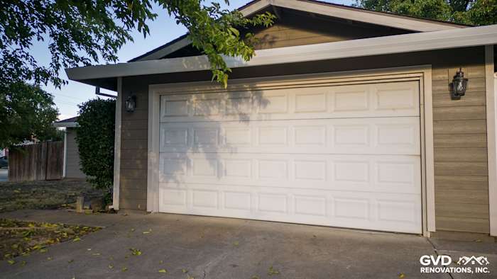Cobble Stone James Hardie lap siding on home exterior with white garage door in Orangevale, CA