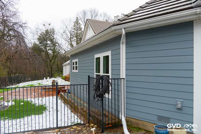 Boothbay Blue James Hardie horizontal lap siding and new Milgard windows on a Sutter Creek home exterior