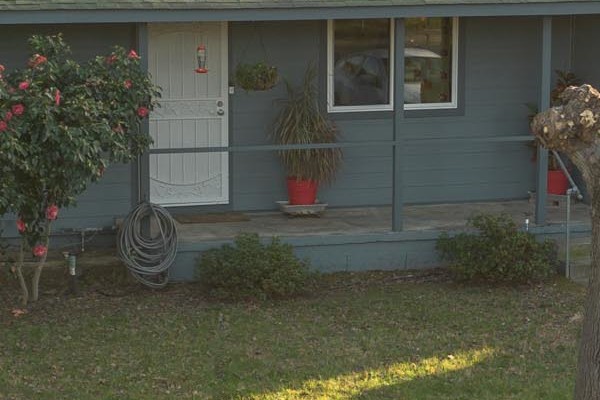 Home exterior with new Boothbay Blue James Hardie siding, Anlin windows, and a landscaped front yard in Orangevale, CA
