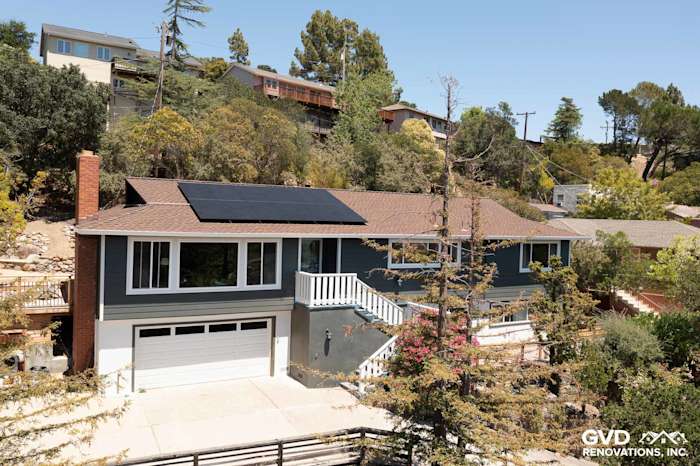 Home exterior showcasing James Hardie Iron Gray siding and Arctic White trim with solar panels in San Rafael